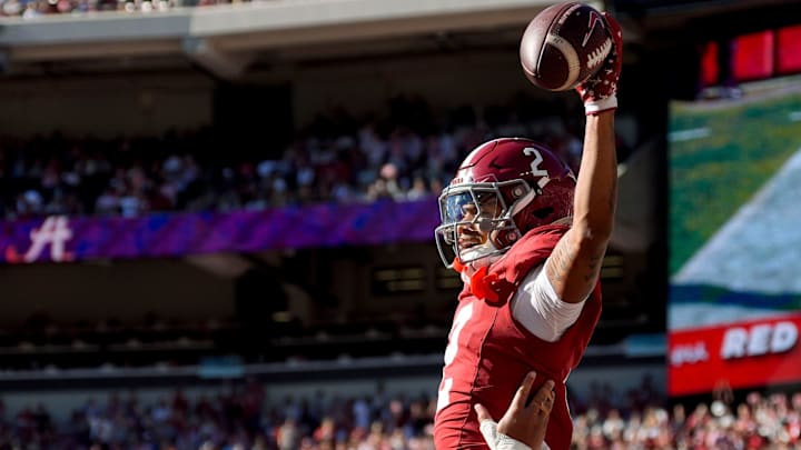 Nov 16, 2024; Tuscaloosa, AL, USA; Alabama Crimson Tide offensive lineman Parker Brailsford (72) lifts Alabama Crimson Tide wide receiver Ryan Williams (2) in celebration after Williams scored against Mercer at Bryant-Denny Stadium. Mandatory Credit: Gary Cosby Jr.-Tuscaloosa News