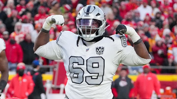 Nov 29, 2024; Kansas City, Missouri, USA; Las Vegas Raiders defensive tackle Adam Butler (69) celebrates after making a sack against the Kansas City Chiefs during the second half at GEHA Field at Arrowhead Stadium. Mandatory Credit: Denny Medley-Imagn Images