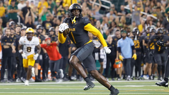 Sep 20, 2025; Waco, Texas, USA; Baylor Bears tight end Michael Trigg (1) runs the ball after a catch for a touchdown against the Arizona State Sun Devils during the second half at McLane Stadium. Mandatory Credit: Chris Jones-Imagn Images