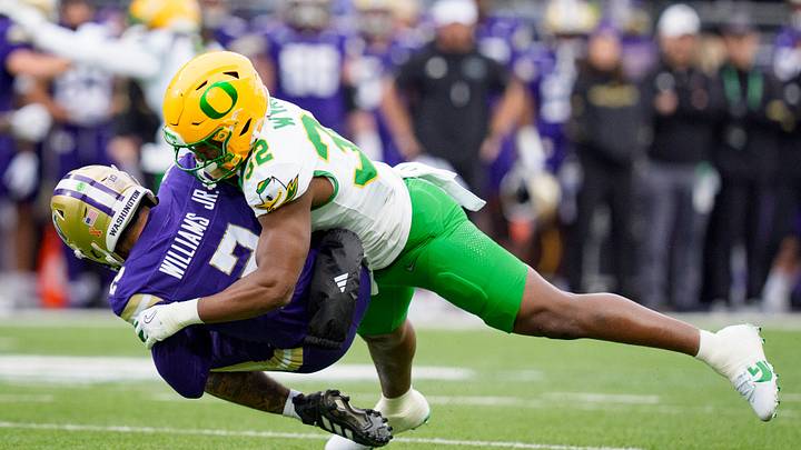 Oregon outside linebacker Nasir Wyatt sacks Washington quarterback Demond Williams Jr. as the Oregon Ducks take on the Washington Huskies on Nov. 29, 2025, at Husky Stadium in Seattle, Washington. Oregon outside linebacker Nasir Wyatt sacks Washington quarterback Demond Williams Jr. as the Oregon Ducks take on the Washington Huskies on Nov. 29, 2025, at Husky Stadium in Seattle, Washington.