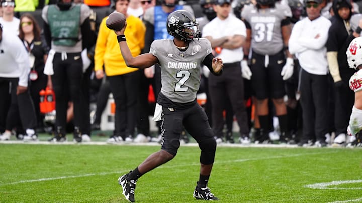 Nov 16, 2024; Boulder, Colorado, USA; Colorado Buffaloes quarterback Shedeur Sanders (2) prepares to pass in the second half against the Utah Utes at Folsom Field. Mandatory Credit: Ron Chenoy-Imagn Images