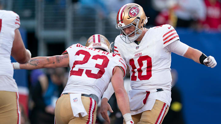 San Francisco 49ers quarterback Mac Jones (10) celebrates with San Francisco 49ers running back Christian McCaffrey (23) after scoring a touchdown during a week 9 game between New York Giants and San Francisco 49ers at MetLife Stadium on Sunday, Nov. 2, 2025.