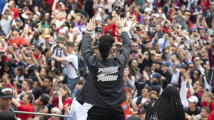 Toronto Raptors player Danny Green acknowledges the crowd during the Championship Parade. 