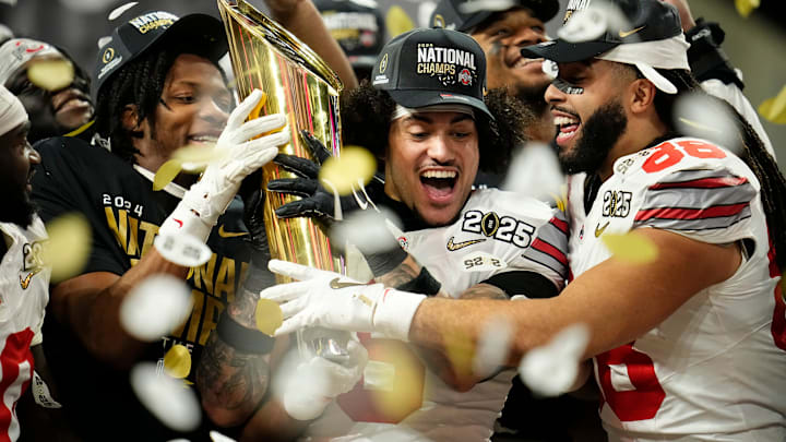 Ohio State safety Lathan Ransom holds the trophy following the Buckeyes' 34-23 win over Notre Dame for the College Football Playoff National Championship. Ohio State safety Lathan Ransom holds the trophy following the Buckeyes' 34-23 win over Notre Dame for the College Football Playoff National Championship.