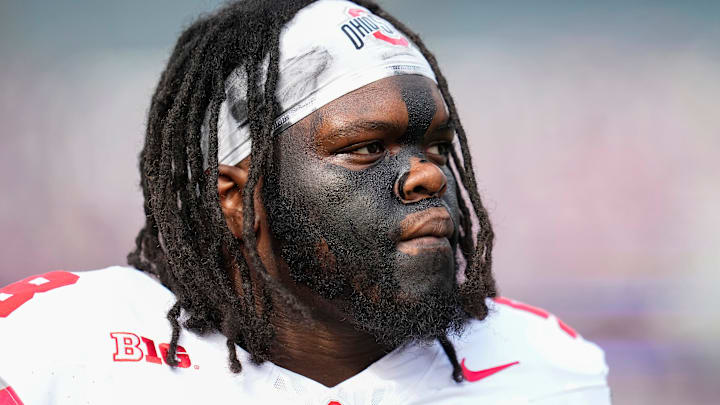 Ohio State Buckeyes DT Kayden McDonald walks off the field after warm-ups before the game against the Washington Huskies. Ohio State Buckeyes DT Kayden McDonald walks off the field after warm-ups before the game against the Washington Huskies.