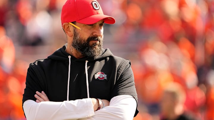 Ohio State Buckeyes defensive coordinator Matt Patricia watches warm ups before a game against the Illinois Fighting Illini 