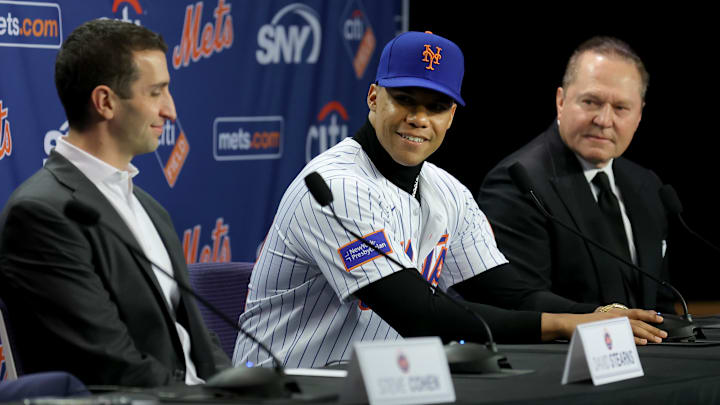 Dec 12, 2024; Flushing, NY, USA; New York Mets right fielder Juan Soto meets the media with general manager David Stearns (left) and agent Scott Boras (right) during a press conference at Citi Field. Mandatory Credit: Brad Penner-Imagn Images Dec 12, 2024; Flushing, NY, USA; New York Mets right fielder Juan Soto meets the media with general manager David Stearns (left) and agent Scott Boras (right) during a press conference at Citi Field. Mandatory Credit: Brad Penner-Imagn Images