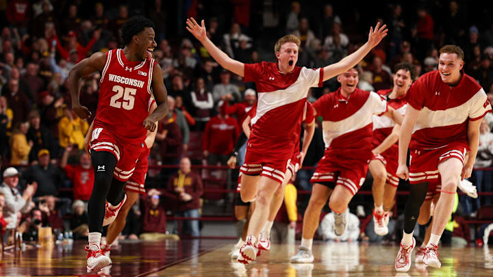 Jan 13, 2026; Minneapolis, Minnesota, USA; Wisconsin Badgers guard John Blackwell (25) celebrates his game winning three-point basket against the Minnesota Golden Gophers during the second half at Williams Arena. Mandatory Credit: Matt Krohn-Imagn Images