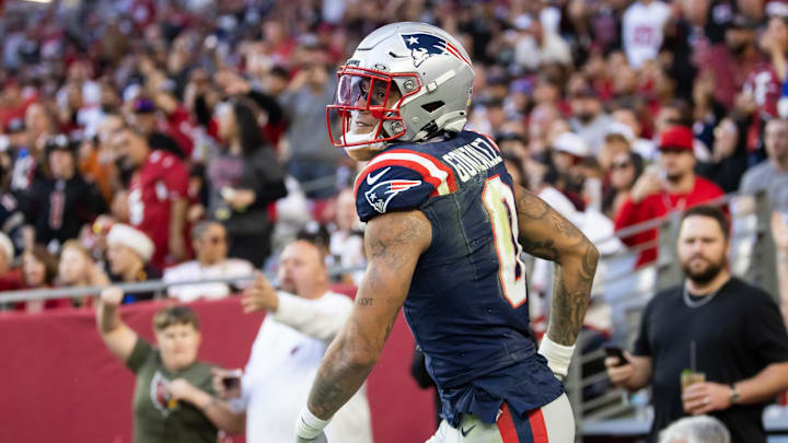 Dec 15, 2024; Glendale, Arizona, USA; New England Patriots cornerback Christian Gonzalez (0) against the Arizona Cardinals at State Farm Stadium.