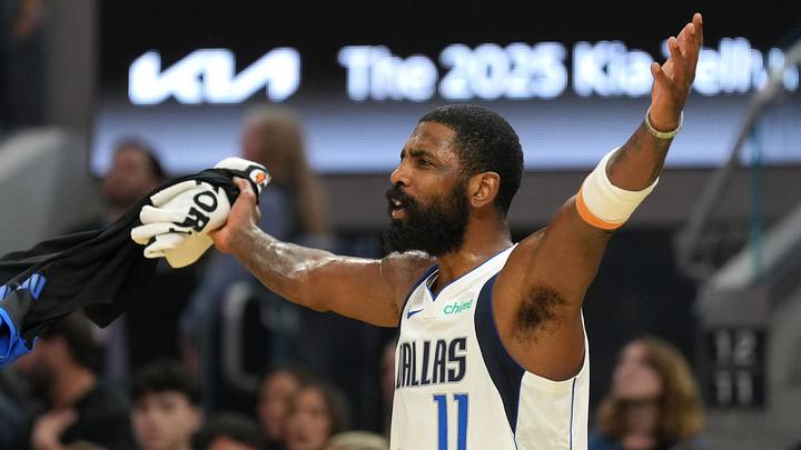 Dec 15, 2024; San Francisco, California, USA; Dallas Mavericks guard Kyrie Irving (11) reacts during the fourth quarter against the Golden State Warriors at Chase Center. Mandatory Credit: Darren Yamashita-Imagn Images