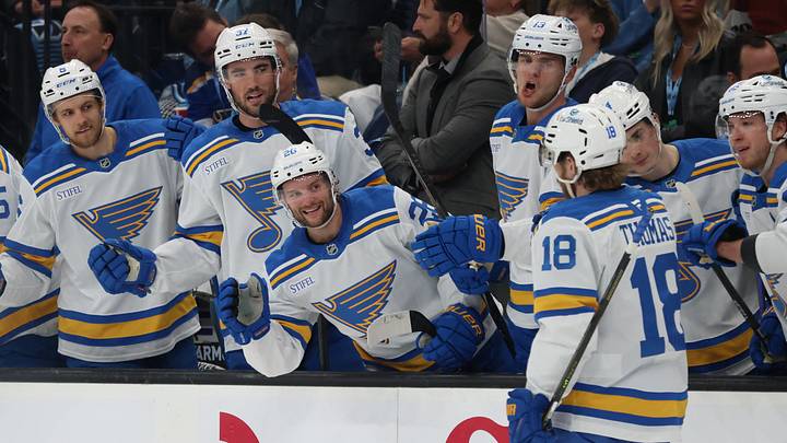 Apr 16, 2026; Salt Lake City, Utah, USA; St. Louis Blues center Robert Thomas (18) celebrates with teammates after scoring a goal against the Utah Mammoth during the second period at Delta Center. Mandatory Credit: Rob Gray-Imagn Images Apr 16, 2026; Salt Lake City, Utah, USA; St. Louis Blues center Robert Thomas (18) celebrates with teammates after scoring a goal against the Utah Mammoth during the second period at Delta Center. Mandatory Credit: Rob Gray-Imagn Images