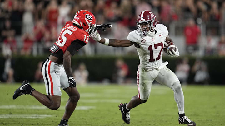 Sep 27, 2025; Athens, Georgia, USA; Alabama Crimson Tide wide receiver Lotzeir Brooks (17) runs against Georgia Bulldogs defensive back Demello Jones (15) in the first half at Sanford Stadium. Mandatory Credit: Dale Zanine-Imagn Images