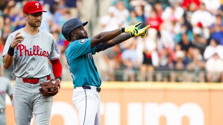 Seattle Mariners left fielder Randy Arozarena (56) celebrates towards the dugout after hitting a double against the Philadelphia Phillies during the first inning at T-Mobile Park on Aug 3.