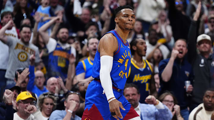 May 3, 2025; Denver, Colorado, USA; Denver Nuggets guard Russell Westbrook (4) reacts after a three point score in the second quarter against the LA Clippers during game seven of first round for the 2025 NBA Playoffs at Ball Arena. Mandatory Credit: Ron Chenoy-Imagn Images