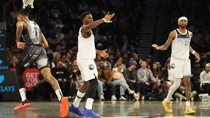 Apr 3, 2025; Brooklyn, New York, USA; Minnesota Timberwolves shooting guard Anthony Edwards (5) reacts to making a three point basket against the Brooklyn Nets during the second half at Barclays Center.