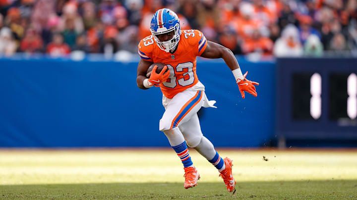  Denver Broncos running back Javonte Williams runs the ball in the second quarter against the Kansas City Chiefs at Empower Field at Mile High.