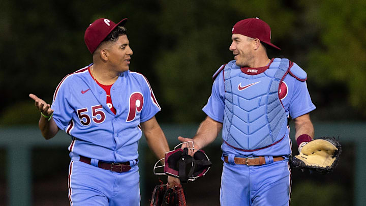 Sep 21, 2023; Philadelphia, Pennsylvania, USA; Philadelphia Phillies starting pitcher Ranger Suarez (55) and catcher J.T. Realmuto (10) talk as they take the field for action against the New York Mets at Citizens Bank Park. Mandatory Credit: Bill Streicher-Imagn Images