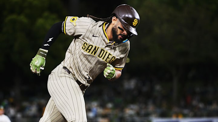 Apr 7, 2025; West Sacramento, California, USA; San Diego Padres outfielder Fernando Tatis Jr. (23) rounds the bases after hitting a home run against the Athletics during the sixth inning at Sutter Health Park. Mandatory Credit: Ed Szczepanski-Imagn Images
