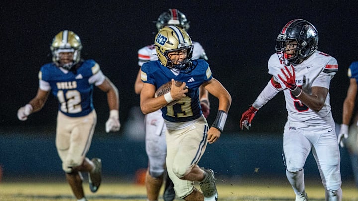 West Boca quarterback Trey Moran looks for a receiver against Miami Southridge in the state semi final game on December 6, 2024, in Boca Raton, Florida.