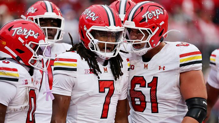 Oct 10, 2026; Columbus, Ohio, USA;  Maryland Terrapins quarterback Malik Washington (7) celebrates his touchdown run with Maryland Terrapins offensive lineman Michael Hershey (61) during the second quarter against the Ohio State Buckeyes at Ohio Stadium.  Mandatory Credit: Joseph Maiorana-Imagn Images