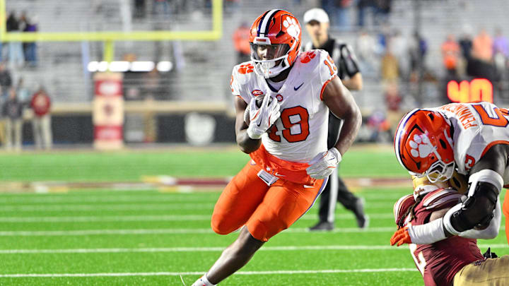 Oct 11, 2025; Chestnut Hill, Massachusetts, USA; Clemson Tigers running back Keith Adams Jr. (19) runs the ball against the Boston College Eagles during the second half at Alumni Stadium. Mandatory Credit: Eric Canha-Imagn Images