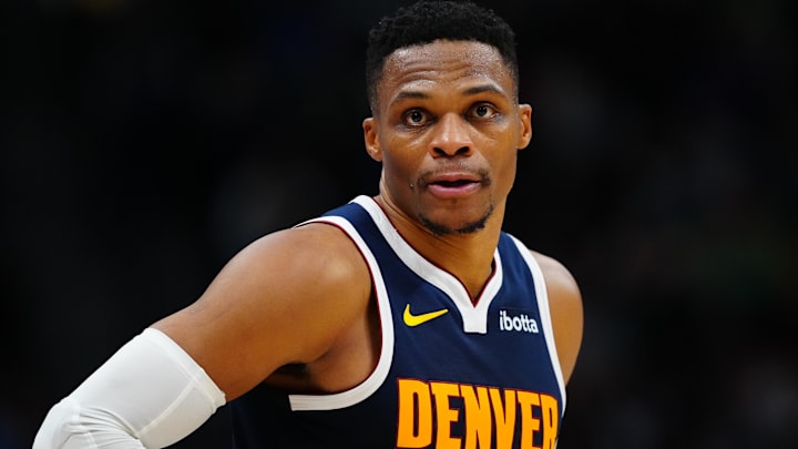 Nov 6, 2024; Denver, Colorado, USA; Denver Nuggets guard Russell Westbrook (4) during the first quarter against the Oklahoma City Thunder at Ball Arena. Mandatory Credit: Ron Chenoy-Imagn Images