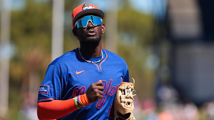 Feb 24, 2026; Port St. Lucie, Florida, USA; New York Mets shortstop Ronny Mauricio (0) returns to the dugout against the Houston Astros during the first inning at Clover Park. Mandatory Credit: Sam Navarro-Imagn Images