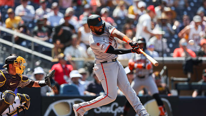 Sep 8, 2024; San Diego, California, USA; San Francisco Giants right fielder Jerar Encarnacion (59) hits a three run home run during the fourth inning against the San Diego Padres at Petco Park. Mandatory Credit: Chadd Cady-Imagn Images