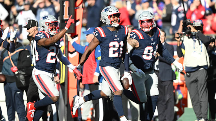 Oct 26, 2025; Foxborough, Massachusetts, USA;  New England Patriots safety Jaylinn Hawkins (21) reacts after intercepting the ball during the third quarter against the Cleveland Browns at Gillette Stadium. Mandatory Credit: Brian Fluharty-Imagn Images