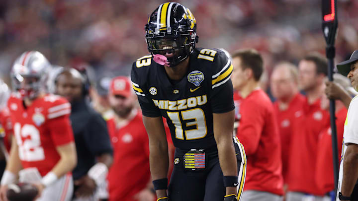 Dec 29, 2023; Arlington, TX, USA; Missouri Tigers defensive back Daylan Carnell (13) reacts after a play in the second quarter against the Ohio State Buckeyes at AT&T Stadium. Mandatory Credit: Tim Heitman-Imagn Images Dec 29, 2023; Arlington, TX, USA; Missouri Tigers defensive back Daylan Carnell (13) reacts after a play in the second quarter against the Ohio State Buckeyes at AT&T Stadium. Mandatory Credit: Tim Heitman-Imagn Images