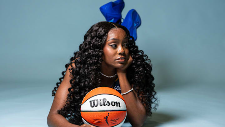 Indiana Fever guard Raven Johnson (3) poses for a photo Wednesday, April 22, 2026, during media day at Gainbridge Fieldhouse in Indianapolis.