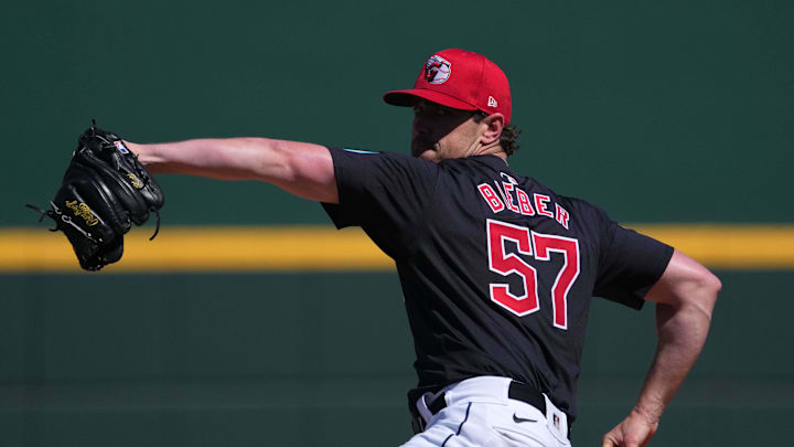 Mar 2, 2024; Goodyear, Arizona, USA; Cleveland Guardians starting pitcher Shane Bieber (57) pitches against the Kansas City Royals during the first inning at Goodyear Ballpark.