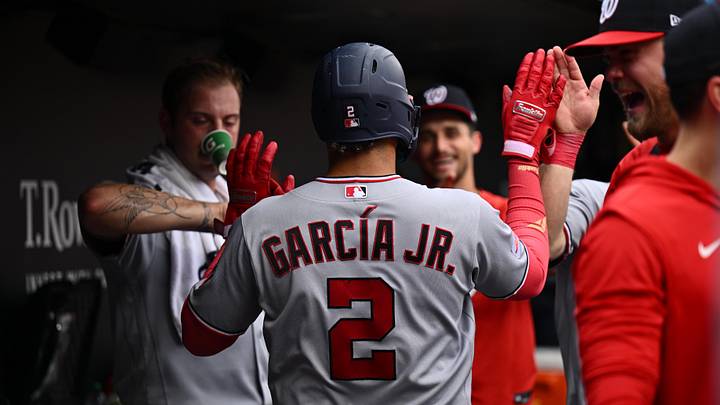 Jun 28, 2026; Baltimore, Maryland, USA;  Washington Nationals infielder Luis Garcia Jr. (2) celebrates in the dugout after hitting his second home run against the Baltimore Orioles in the seventh inning at Oriole Park at Camden Yards. Mandatory Credit: Jamie Sabau-Imagn Images