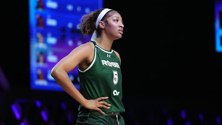 Jan 17, 2025; Miami, FL, USA; Angel Reese (5) of the Rose takes a moment against the Vinyl during a timeout in the first half of the Unrivaled women’s professional 3v3 basketball league at Wayfair Arena. 