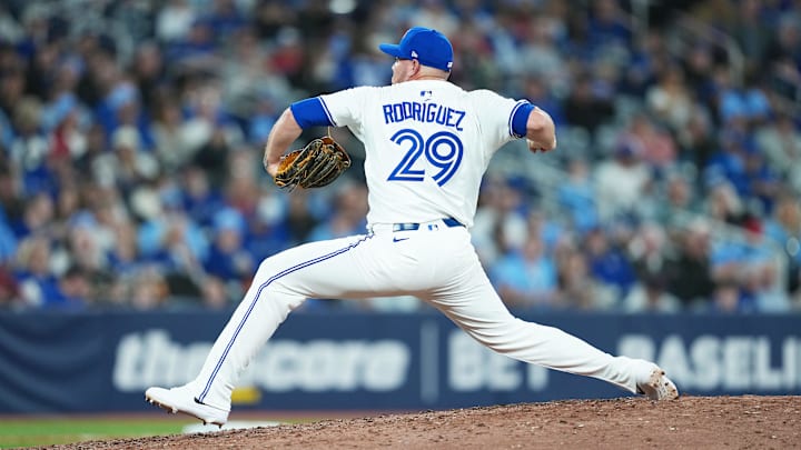 Mar 27, 2025; Toronto, Ontario, CAN; Toronto Blue Jays relief pitcher Yariel Rodriguez (29) throws a pitch against the Baltimore Orioles during the eighth inning at Rogers Centre. 