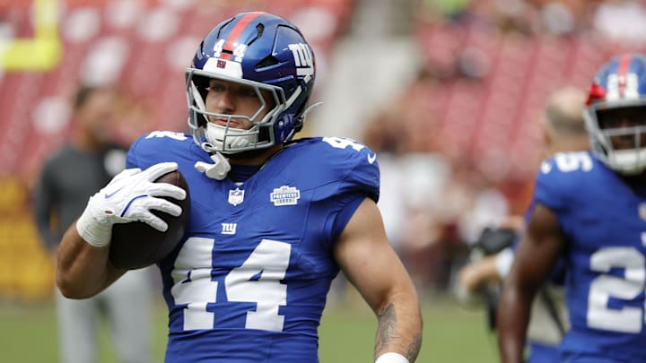 New York Giants running back Cam Skattebo (44) prior to the game against the Washington Commanders at Northwest Stadium. 