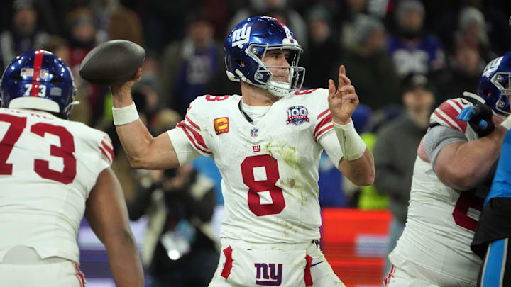 Nov 10, 2024; Munich, Germany; New York Giants quarterback Daniel Jones (8) throws the ball against the Carolina Panthers in the second half during the 2024 NFL Munich Game at Allianz Arena. Mandatory Credit: Kirby Lee-Imagn Images Nov 10, 2024; Munich, Germany; New York Giants quarterback Daniel Jones (8) throws the ball against the Carolina Panthers in the second half during the 2024 NFL Munich Game at Allianz Arena. Mandatory Credit: Kirby Lee-Imagn Images
