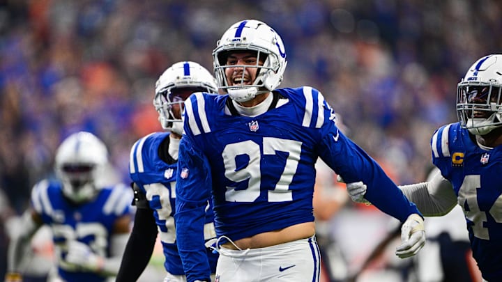 Sep 22, 2024; Indianapolis, Indiana, USA; Indianapolis Colts defensive end Laiatu Latu (97) celebrates a sack during the second half against the Chicago Bears at Lucas Oil Stadium. Mandatory Credit: Marc Lebryk-Imagn Images

