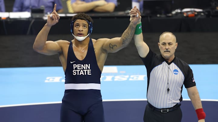 Penn State Nittany Lions wrestler Greg Kerkvliet celebrates after beating Michigan Wolverines wrestler Lucas Davison at the T-Mobile Center. 