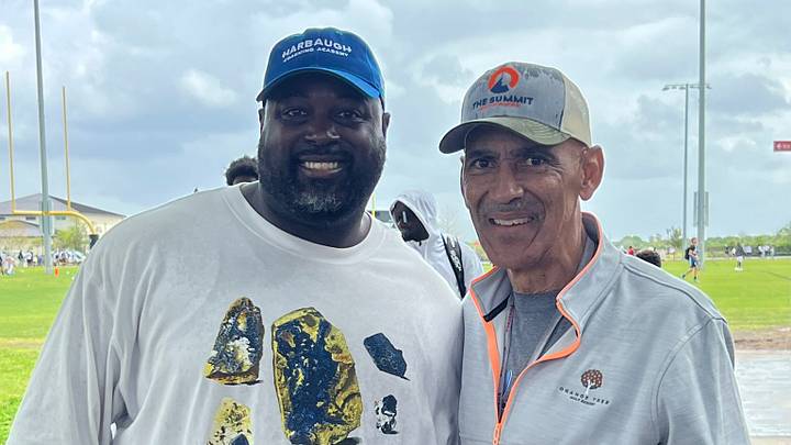 Prior to Carlos Woods' (left) dismissal from Sarasota Booker, an investigation by the FHSAA found that eighth grade football players practiced with the varsity team in the spring. Booker has since been fined $500. Prior to Carlos Woods' (left) dismissal from Sarasota Booker, an investigation by the FHSAA found that eighth grade football players practiced with the varsity team in the spring. Booker has since been fined $500.
