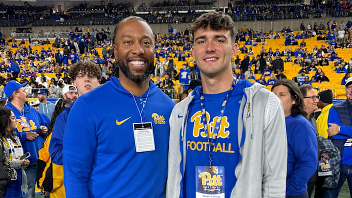 Peters Township LB Reston Lehman pictured with Pitt football legend Larry Fitzgerald