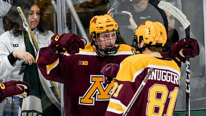 Minnesota's Oliver Moore, left, celebrates his goal with Jimmy Snuggerud, right, during the second period in the game against Michigan State on Friday, Jan. 26, 2024, at Munn Arena in East Lansing. Minnesota's Oliver Moore, left, celebrates his goal with Jimmy Snuggerud, right, during the second period in the game against Michigan State on Friday, Jan. 26, 2024, at Munn Arena in East Lansing.