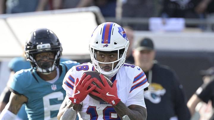 Jan 11, 2026; Jacksonville, FL, USA; Buffalo Bills wide receiver Brandin Cooks (18) runs with the ball during the second half against the Jacksonville Jaguars in an AFC Wild Card Round game at EverBank Stadium. 