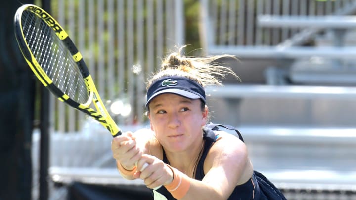 Lulu Sun of Switzerland reaches for a backhand return during her opening round loss to Taylor Townsend of the United States, in the Thoreau Tennis Open, Monday, August 8, 2022.

Thoreau Tennis Open 091