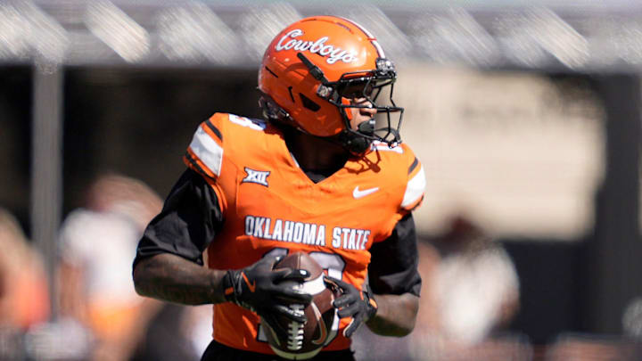 Oklahoma State's Sam Jackson V (18) reacts after a reception in the first half of the college football game between the Oklahoma State Cowboys and the Baylor Bears at Boone Pickens Stadium in Stillwater, Okla., Saturday, Sept. 27, 2025.