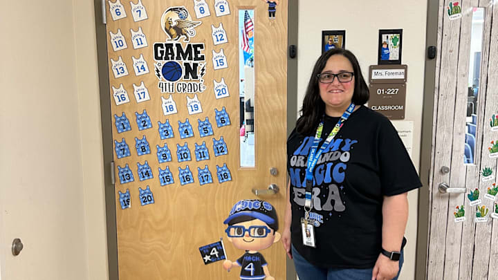 Jennifer Lopez, a.k.a. Mrs. Magic, stands outside of her fourth-grade math and science classroom at Stonewyck Elementary School in Orlando.
