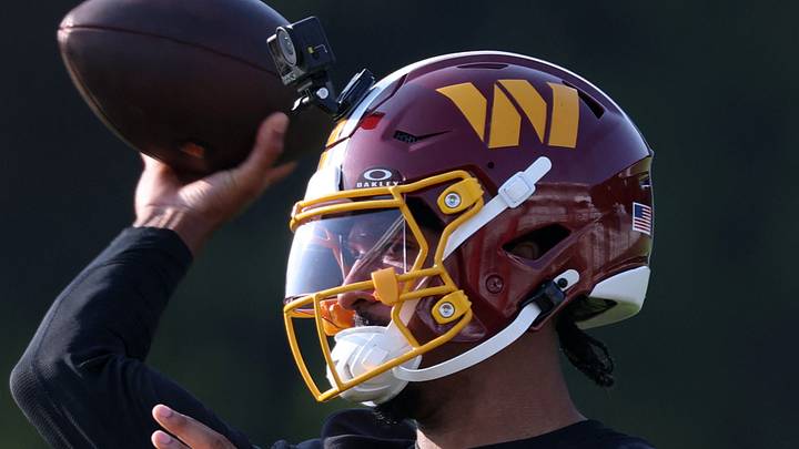 Jul 29, 2026; Ashburn, VA, USA; Washington Commanders quarterback Jayden Daniels (5) passes the ball during a drill on day one of training camp at BigBear.ai Performance Center at Commanders Park. Mandatory Credit: Geoff Burke-Imagn Images Jul 29, 2026; Ashburn, VA, USA; Washington Commanders quarterback Jayden Daniels (5) passes the ball during a drill on day one of training camp at BigBear.ai Performance Center at Commanders Park. Mandatory Credit: Geoff Burke-Imagn Images