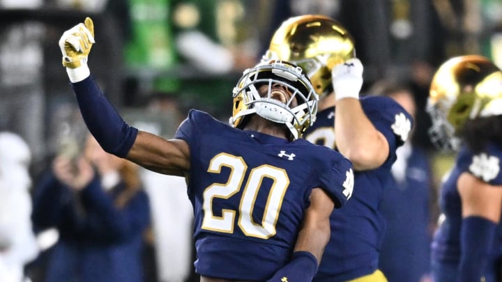 Oct 14, 2023; South Bend, Indiana, USA; Notre Dame Fighting Irish cornerback Benjamin Morrison (20) celebrates after an interception in the second quarter against the USC Trojans at Notre Dame Stadium. Mandatory Credit: Matt Cashore-USA TODAY Sports Oct 14, 2023; South Bend, Indiana, USA; Notre Dame Fighting Irish cornerback Benjamin Morrison (20) celebrates after an interception in the second quarter against the USC Trojans at Notre Dame Stadium. Mandatory Credit: Matt Cashore-USA TODAY Sports