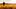 African woman in traditional clothes standing, looking, hand to eyes, in field of barley or wheat crops at sunset or sunrise African woman in traditional clothes standing, looking, hand to eyes, in field of barley or wheat crops at sunset or sunrise