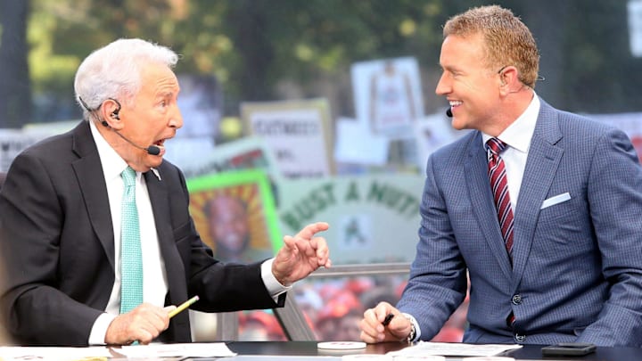 Hosts Lee Corso, at left, and Kirk Herbstreit talk during the ESPN College GameDay show on Saturday,